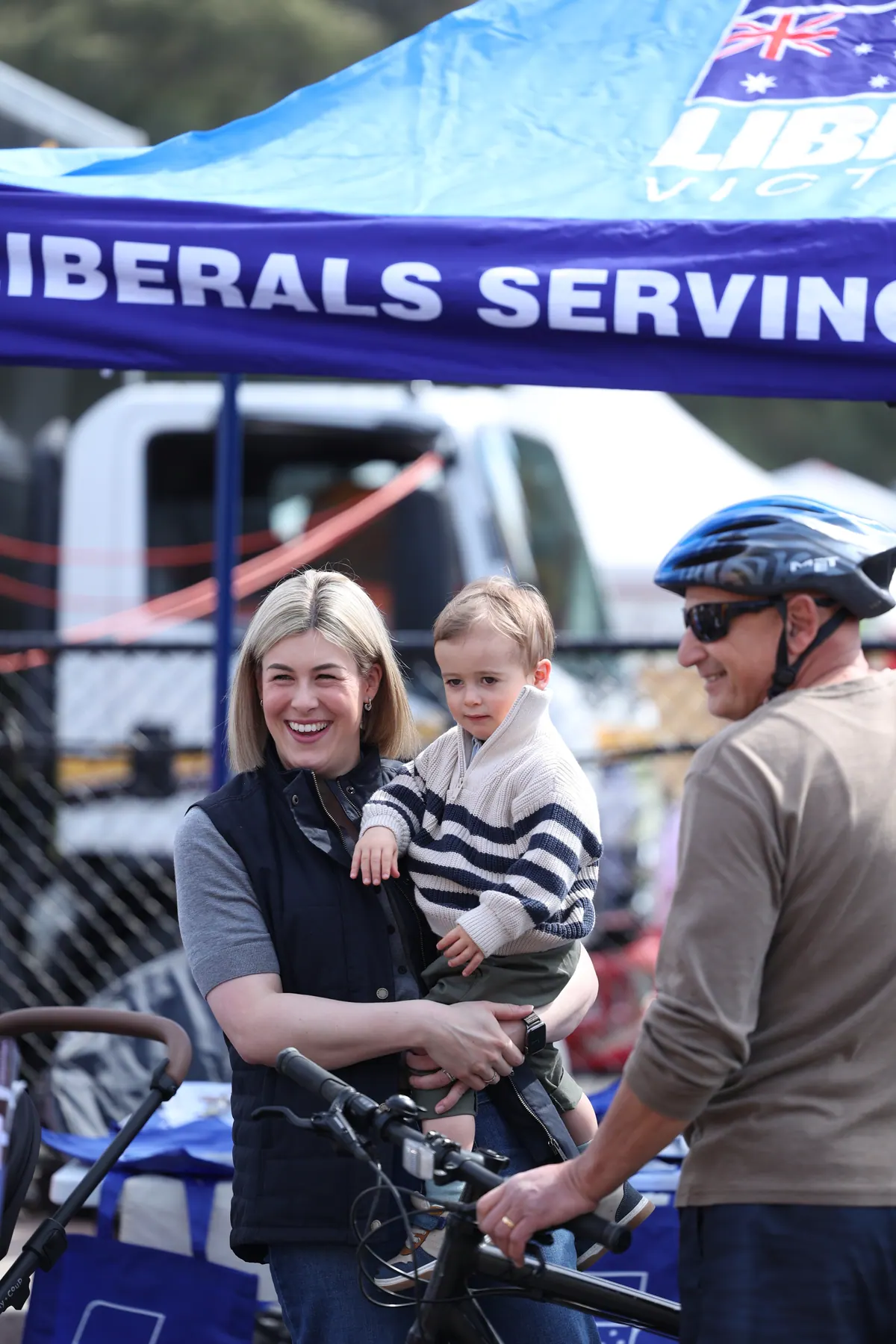 Jess Wilson talks with locals at a community stall