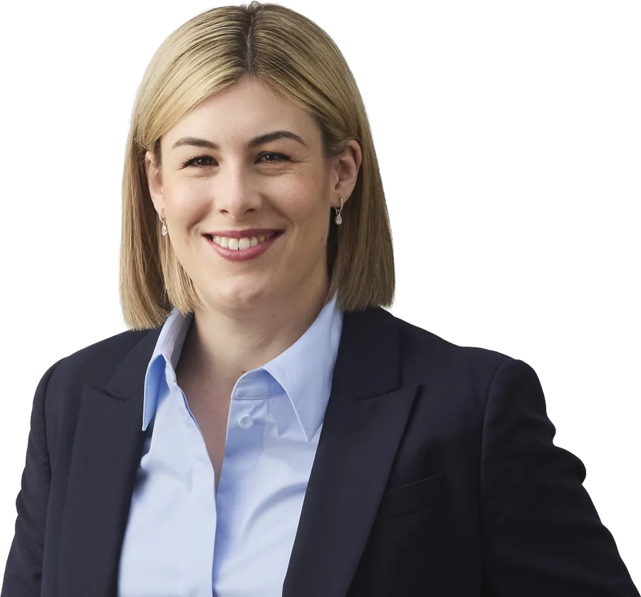 Jess Wilson, smiling, in a navy suit